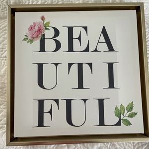 Pair of decorative canvases with gold frame